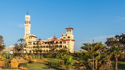 Fototapeta na wymiar Day shot of Montaza public park with Royal palace and Palestine Hotel at far end, Alexandria, Egypt