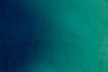 Fototapeta na wymiar Turquoise gradient cement wall texture with pattern. Turquoise or green background