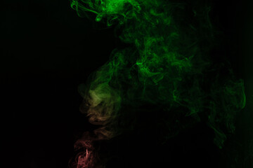 Green and pink steam on a black background.
