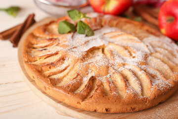 Appetizing pie close-up on a wooden background