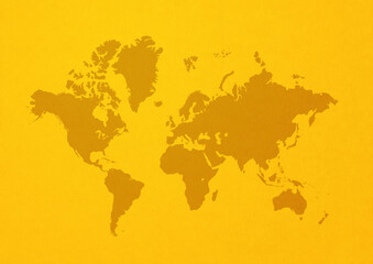 World map on yellow wall background