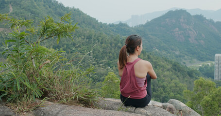 Woman look at the city view from top