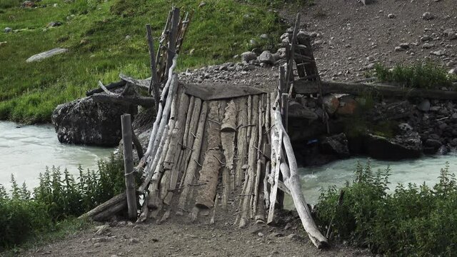 The old wooden cow bridge for cattle overlanding to the summer pasture in mountain
