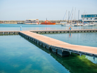 Pontoon bridge for boats at Turistic Port or harbor in Constanta, Romania .