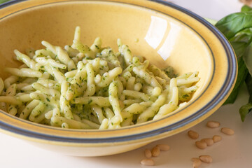 A freshly cooked plate of Italian Trofie pasta with Pesto sauce