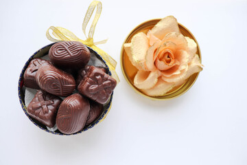 chocolate candies in a beautiful gift box isolated on white background 