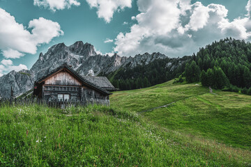 Fototapeta na wymiar Old alpine hut in the Dolomites, Italy.