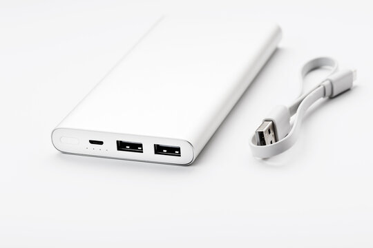 Power bank for charging mobile devices and gadgets on a white background