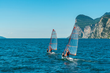 Fototapeta premium Beautiful peaceful lake Garda, Italy. Sailing boat.