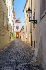 Fototapeta premium View to the street in the old center of Prague - the capital and largest city of the Czech Republic - travel background