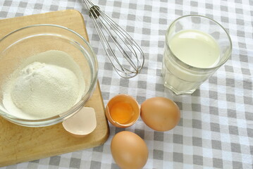 Fototapeta na wymiar Ingredients for baking or scrambled eggs or omlette