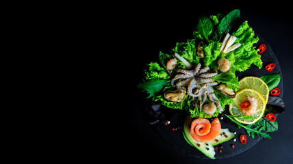 Fototapeta premium Photo of an octopus on a black board
