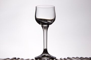 Silhouette of liqueur glass on white background 