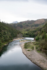 Fototapeta na wymiar Beautiful landscape with Nalon river and mountains around near Las Caldas, Oviedo