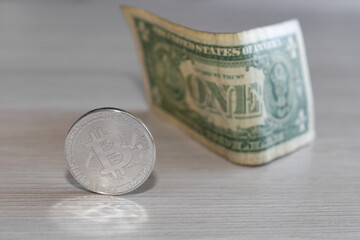 bitcoin coin on a dollar background