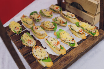 Catering service. Restaurant table with food at event. Shallow depth of view.