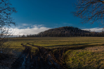 Fototapeta premium Sunset near Spicak hill in Krusne mountains in north Bohemia in winter day