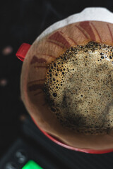 brewing coffee hot water dark background