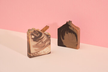 Organic handmade soap with natural chocolate and cinnamon on a pink background. Spa at your home....