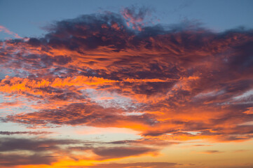 magical bright orange couds at sunrise as abstract cloud background
