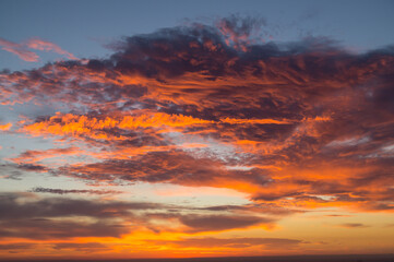 Fototapeta premium magical orange and pink clouds at sunrise abstract nature background
