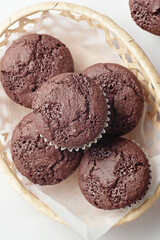 Delicious homemade chocolate muffins close-up.