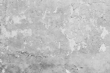 Texture of a concrete wall with cracks and scratches which can be used as a background