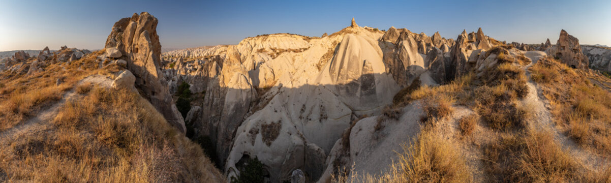 The picturesque panorama of Cappadocia at sunset, amazing Turkey, Mountains and rock formation, big size image, Goreme national park, Love valley, open air museum, ancient region of Anatolia, Unesco