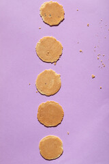 homemade cookies on purple background, creative food photography
