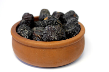 Ajwa dates. Dried dates. Prophet dates on white background. Iftar time