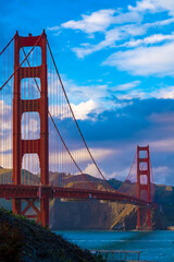 San Francisco Bridge at sunset, with pastel clouds. 