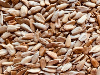 Sunflower seeds background, brown well roasted sunflower seeds healthy snack.
