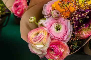Beautiful tender blossoming of fresh cut bouquet of Ranunculus. Floral composition for romantic gift
