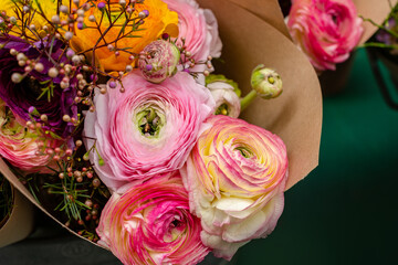 Beautiful tender blossoming of fresh cut bouquet of Ranunculus. Floral composition for romantic gift