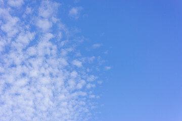 White clouds and blue sky during the day.