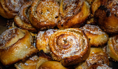 Sweet buns with coconut. Brazilian style sticky buns. Bread with a sweet coconut syrup.
