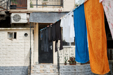 Fototapeta na wymiar Courtyard where clothes are dried in Tbilisi. Georgia. Side view.