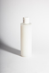 Plastic containers without labels or brand on a white background. 