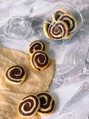 Shortbread chocolate cookies in the shape of a spiral.