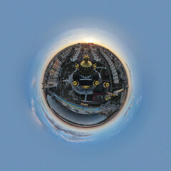 Aerial panoramic view from a drone to the sunset over the city of Kyiv on Obolonskaya embankment