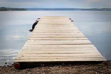 A wooden dock with a vanishing view perspective