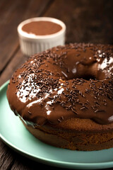 Homemade chocolate cake with chocolate sauce topping.