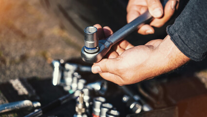 Mechanic working in garage. Repair service.