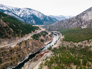 Fototapeta na wymiar Aerial view over river and mountains