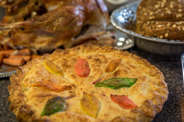 Autumn Decorated Apple Pie For Thanksgiving Dinner With a Shallow Depth of Field