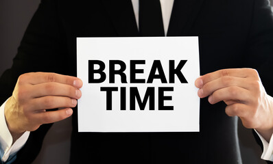 text Break time on white paper. Business concept