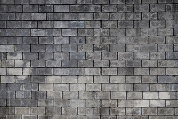Wall of concrete gray bricks pattern background