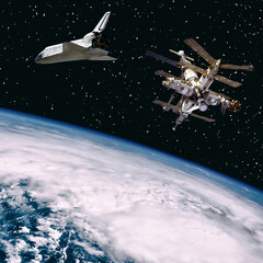 Spaceships above the earth. The elements of this image furnished by NASA.