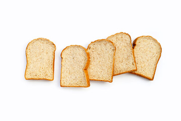 Sliced whole wheat bread on white background.