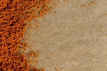 A close up view of paprika or chili powder taken in natural light.